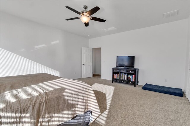 1045 Belmont Pl, Yukon, OK 73099 - carpeted bedroom featuring ceiling fan and baseboards