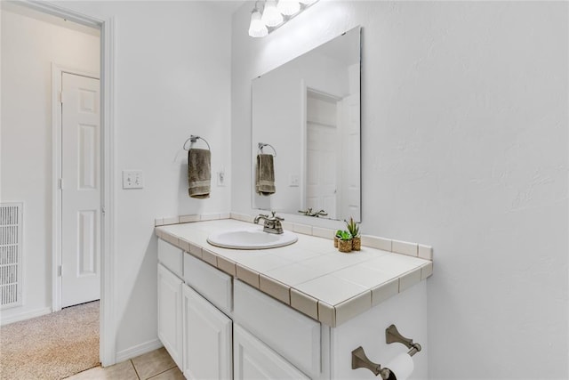 1045 Belmont Pl, Yukon, OK 73099 - bathroom with vanity and baseboards