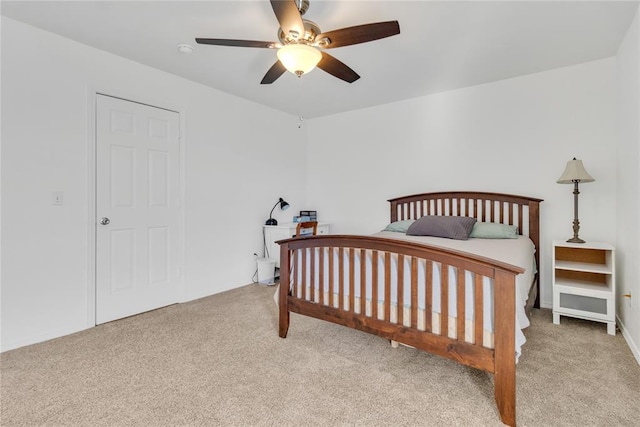 1045 Belmont Pl, Yukon, OK 73099 - carpeted bedroom with a ceiling fan