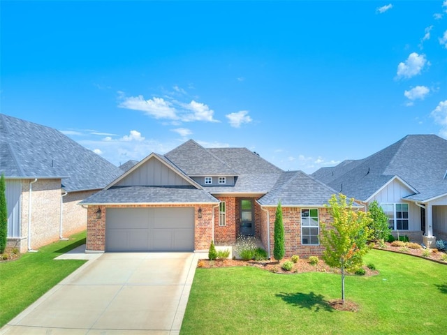 201 Pont Neuf Ct, Edmond, OK 73034 - view of front of house featuring brick siding, a garage, driveway, a front yard, and a shingled roof