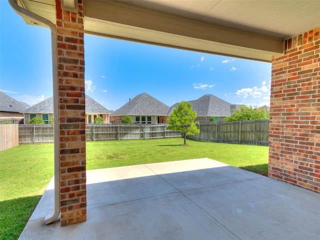 201 Pont Neuf Ct, Edmond, OK 73034 - fenced backyard with a patio area