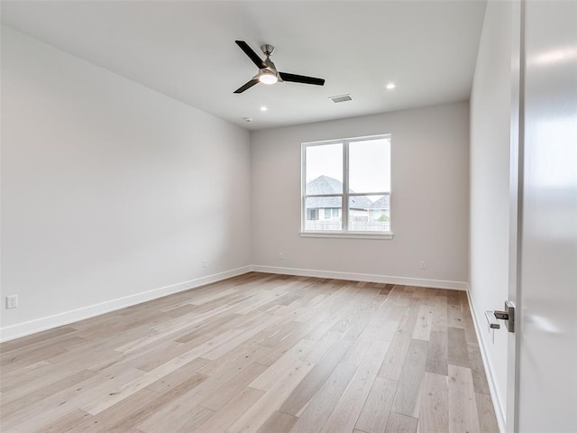 201 Pont Neuf Ct, Edmond, OK 73034 - empty room with light wood-style flooring, ceiling fan, and recessed lighting