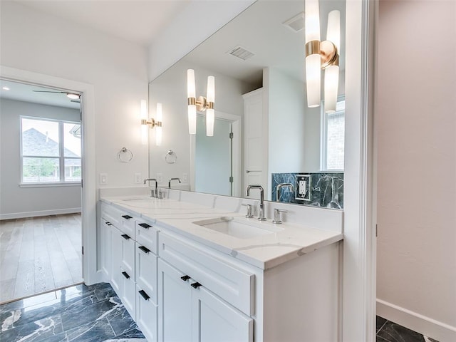 201 Pont Neuf Ct, Edmond, OK 73034 - bathroom with double vanity and marble finish flooring