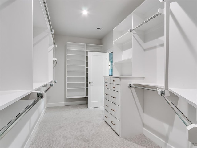201 Pont Neuf Ct, Edmond, OK 73034 - walk in closet with light colored carpet