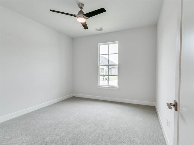 201 Pont Neuf Ct, Edmond, OK 73034 - spare room with ceiling fan and carpet floors