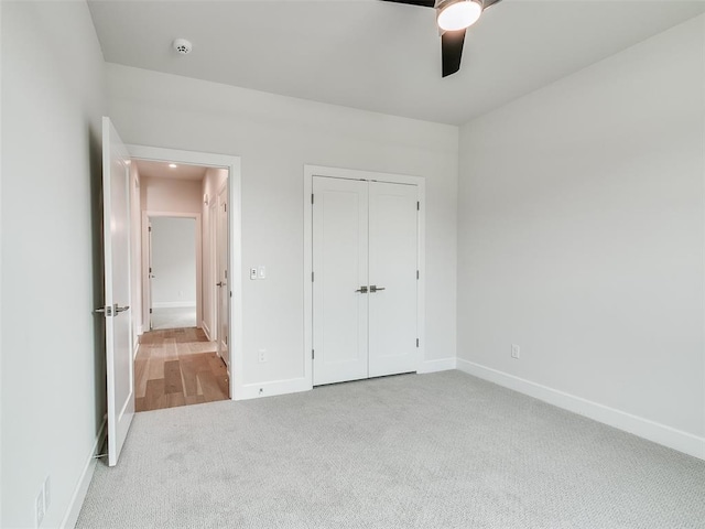 201 Pont Neuf Ct, Edmond, OK 73034 - unfurnished bedroom featuring carpet floors, a closet, and ceiling fan