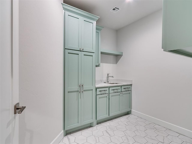 201 Pont Neuf Ct, Edmond, OK 73034 - washroom featuring a sink and light flooring