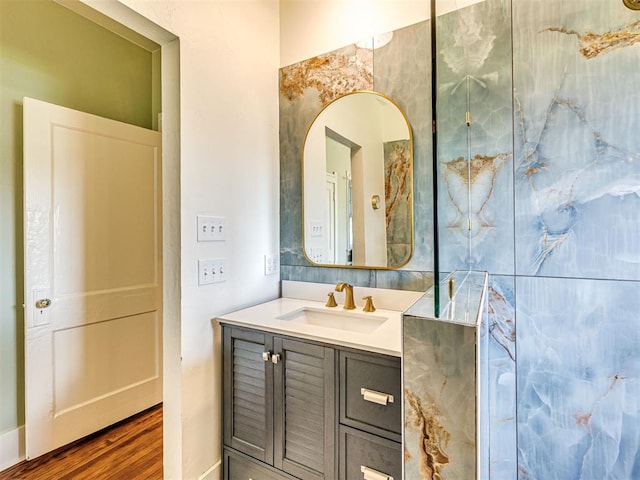 701 NW 21st St, Oklahoma City, OK 73103 - bathroom with vanity and wood finished floors