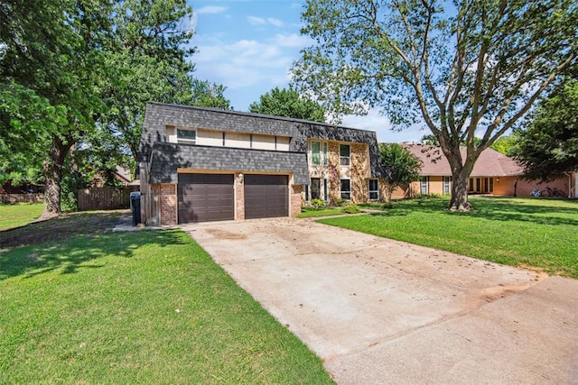 11904 Somerville Dr, Yukon, OK 73099 - view of front of home with driveway, brick siding, and stone siding
