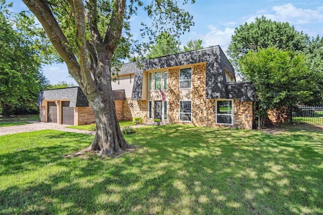 11904 Somerville Dr, Yukon, OK 73099 - view of front of house featuring stone siding and a garage