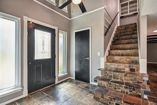 11904 Somerville Dr, Yukon, OK 73099 - entryway with ceiling fan, stairway, and a towering ceiling