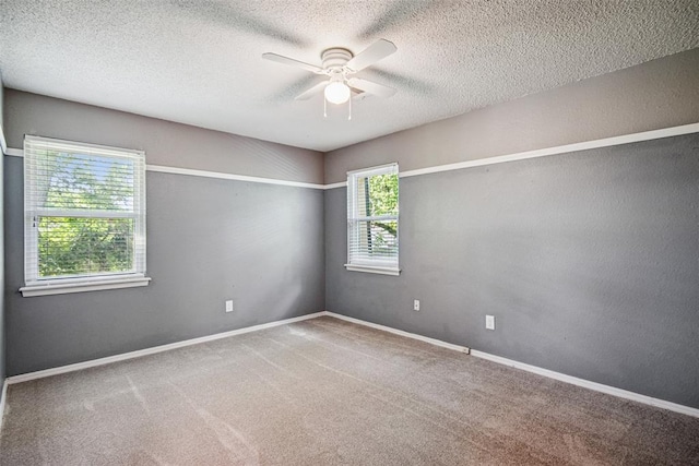 11904 Somerville Dr, Yukon, OK 73099 - empty room with ceiling fan, carpet, and a textured ceiling