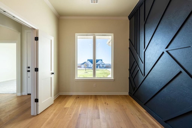 4334 White Ash Dr, Piedmont, OK 73078 - unfurnished bedroom with light wood-style floors and ornamental molding