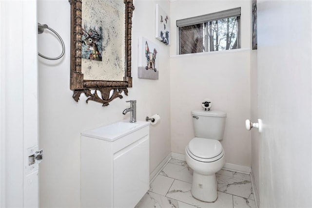 2299 Coretta Ave, Duncan, OK 73534 - half bathroom featuring vanity and marble finish floors