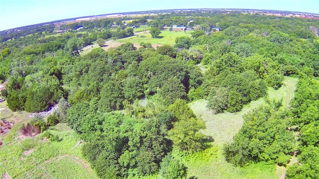 2299 Coretta Ave, Duncan, OK 73534 - aerial view of property and surrounding area with a heavily wooded area