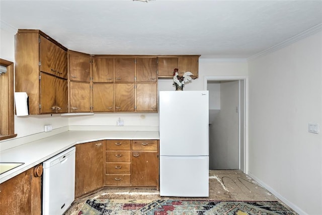 2299 Coretta Ave, Duncan, OK 73534 - kitchen with white appliances, brown cabinets, light countertops, and crown molding