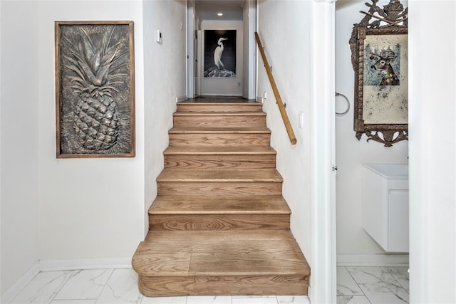 2299 Coretta Ave, Duncan, OK 73534 - stairs with marble look tiles and baseboards
