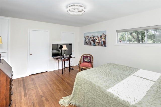 2299 Coretta Ave, Duncan, OK 73534 - bedroom featuring wood-type flooring