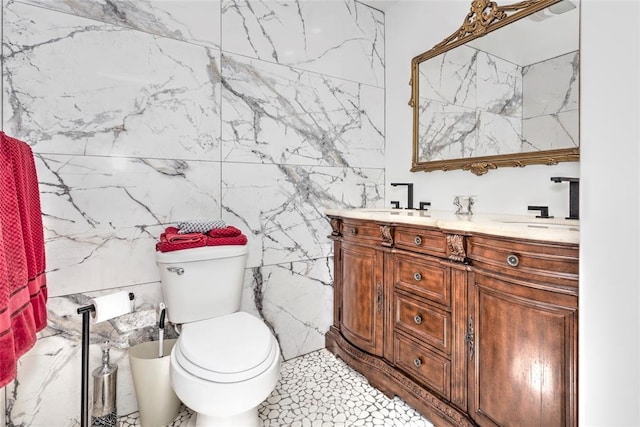 2299 Coretta Ave, Duncan, OK 73534 - bathroom with double vanity and tile walls