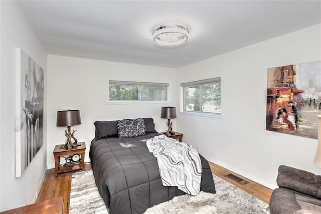 2299 Coretta Ave, Duncan, OK 73534 - bedroom with wood finished floors