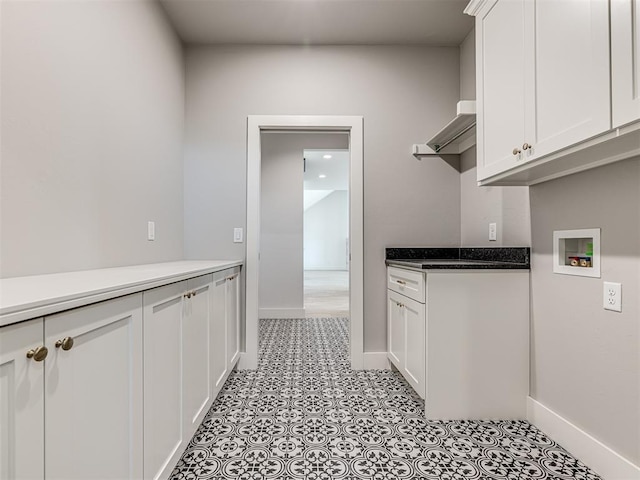 6881 Lake View Ct, Cashion, OK 73016 - washroom with cabinet space and washer hookup