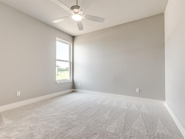 6881 Lake View Ct, Cashion, OK 73016 - carpeted empty room with ceiling fan and baseboards