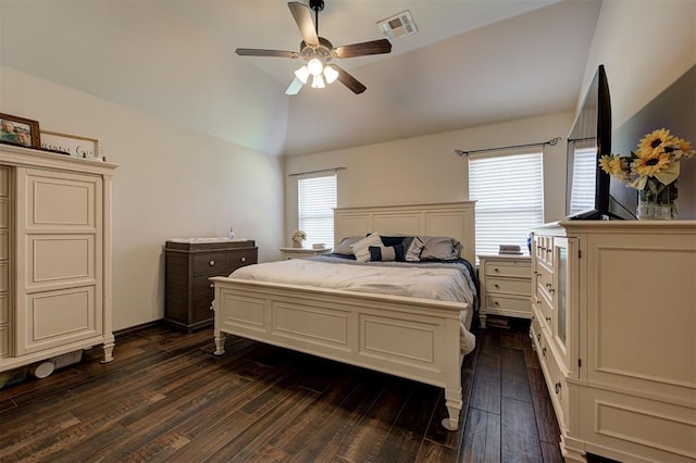 2305 Makaila Way, Yukon, OK 73099 - bedroom with lofted ceiling, dark wood-style floors, and a ceiling fan