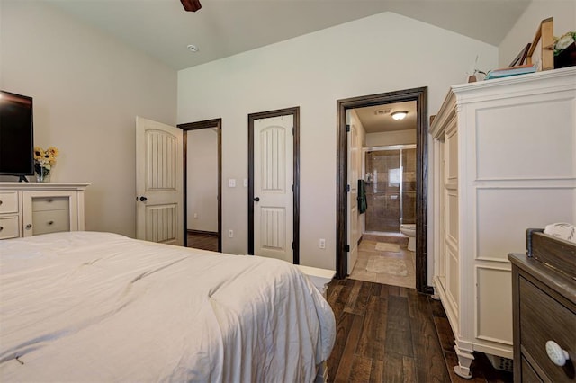 2305 Makaila Way, Yukon, OK 73099 - bedroom featuring lofted ceiling, dark wood-type flooring, ensuite bath, and a ceiling fan