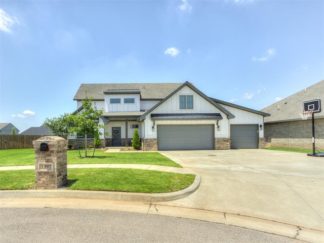 1391 Hickory Trl, Piedmont, OK 73078 - craftsman house with board and batten siding, driveway, a garage, roof with shingles, and stone siding
