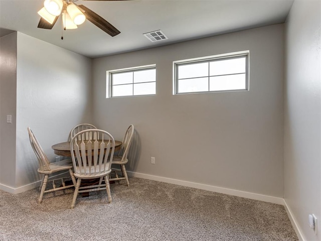 1391 Hickory Trl, Piedmont, OK 73078 - carpeted dining space featuring plenty of natural light and ceiling fan