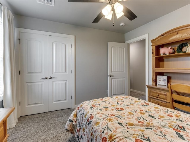 1391 Hickory Trl, Piedmont, OK 73078 - carpeted bedroom featuring a closet and ceiling fan