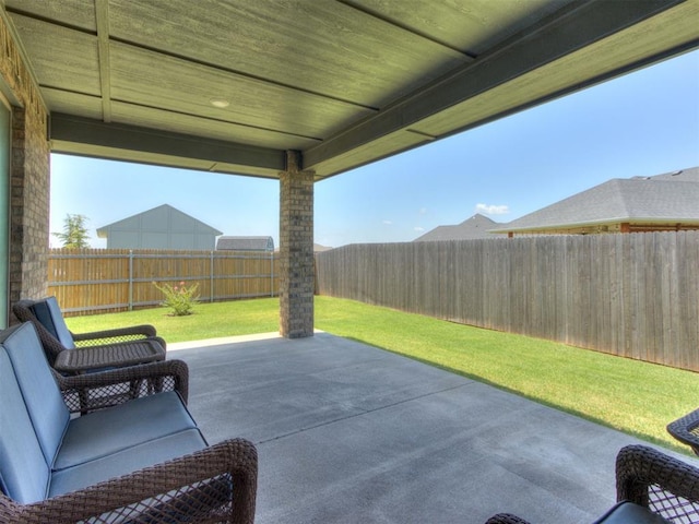 1391 Hickory Trl, Piedmont, OK 73078 - fenced backyard with a patio area