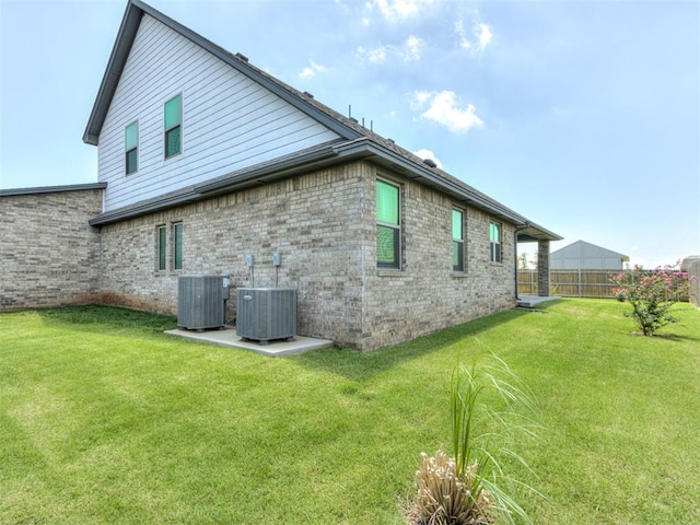 1391 Hickory Trl, Piedmont, OK 73078 - rear view of property featuring brick siding