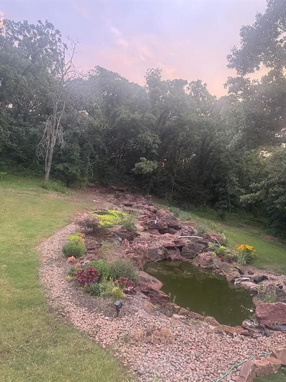 7013 Morning Song Dr, Oklahoma City, OK 73150 - view of yard featuring a view of trees