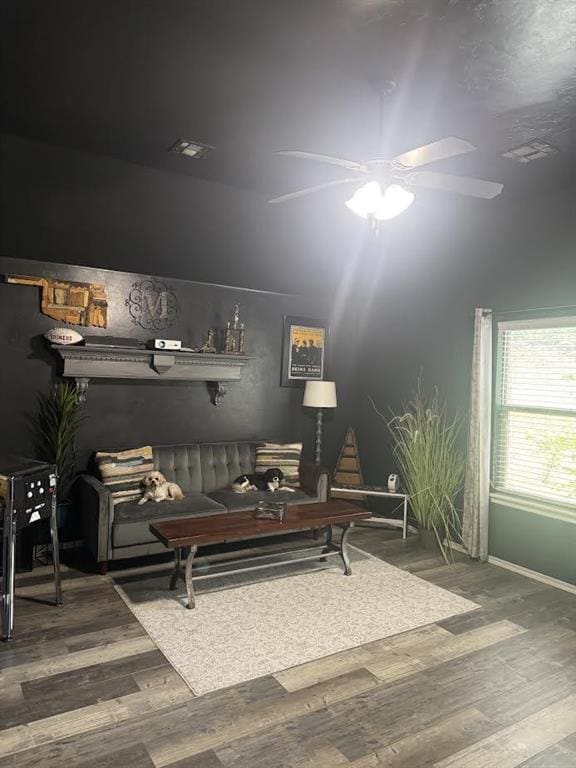 7013 Morning Song Dr, Oklahoma City, OK 73150 - living area with wood finished floors and a ceiling fan