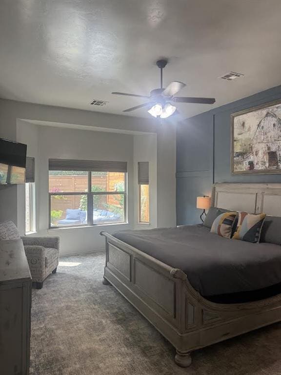 7013 Morning Song Dr, Oklahoma City, OK 73150 - carpeted bedroom featuring a ceiling fan