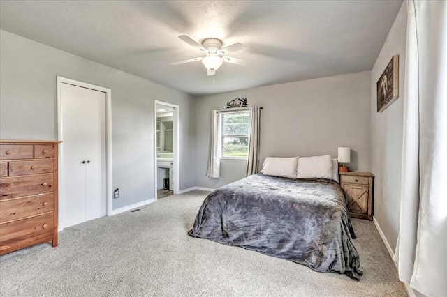 601 N Dobbs Rd, Harrah, OK 73045 - bedroom featuring carpet, ensuite bathroom, and ceiling fan