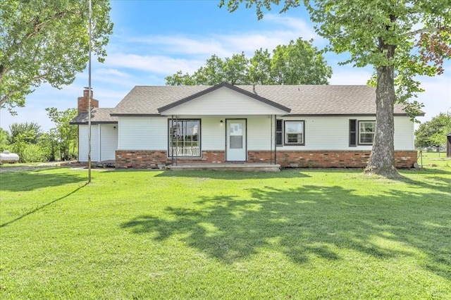 601 N Dobbs Rd, Harrah, OK 73045 - single story home featuring brick siding and a front lawn