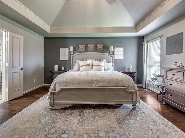 2009 Pembroke Ln, Edmond, OK 73003 - bedroom with vaulted ceiling and wood finished floors