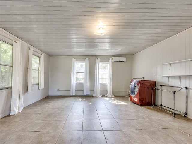 3804 NW 52nd St, Oklahoma City, OK 73112 - spare room with a wall unit AC, plenty of natural light, and light tile patterned floors