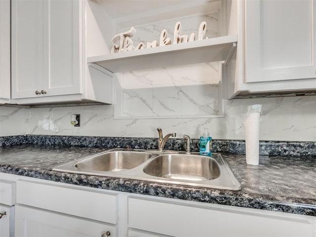3804 NW 52nd St, Oklahoma City, OK 73112 - kitchen with dark countertops, white cabinets, open shelves, and decorative backsplash