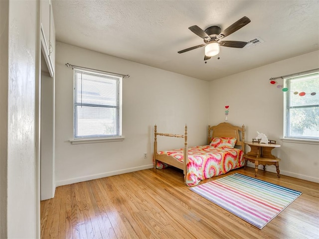 3804 NW 52nd St, Oklahoma City, OK 73112 - bedroom featuring light wood-type flooring and a ceiling fan