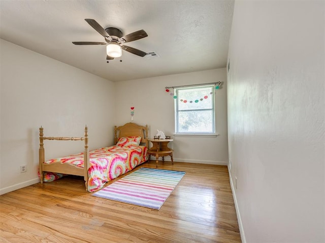3804 NW 52nd St, Oklahoma City, OK 73112 - bedroom with wood finished floors and ceiling fan