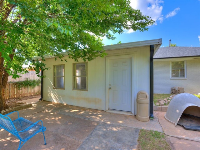 3804 NW 52nd St, Oklahoma City, OK 73112 - entrance to property with a patio and brick siding