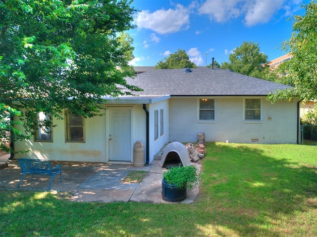 3804 NW 52nd St, Oklahoma City, OK 73112 - rear view of property with brick siding, roof with shingles, and a patio area