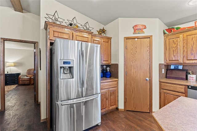 5097 County St Unit 2580, Hinton, OK 73047 - kitchen with stainless steel fridge with ice dispenser, dark wood finished floors, light countertops, tasteful backsplash, and brown cabinets