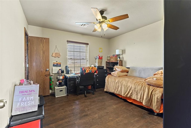 5097 County St Unit 2580, Hinton, OK 73047 - bedroom featuring an office area, wood finished floors, and ceiling fan