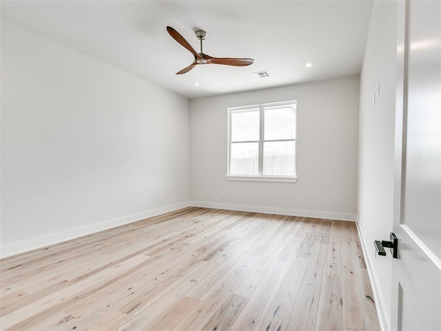 216 Pont Neuf Ct, Edmond, OK 73034 - spare room featuring light wood-style floors, ceiling fan, and recessed lighting