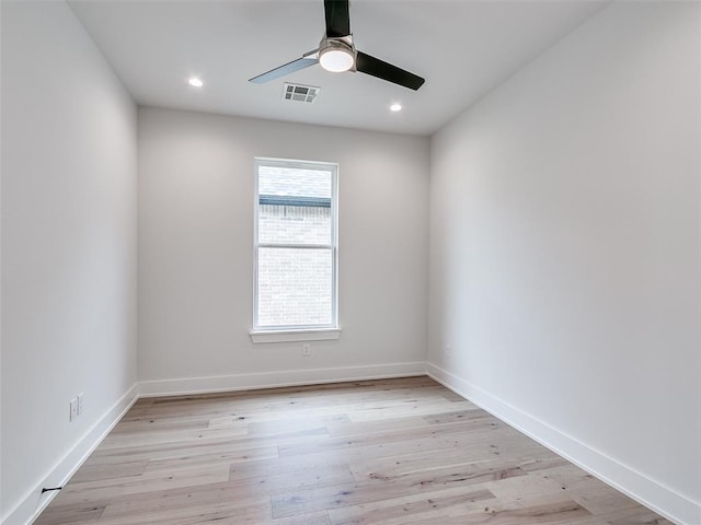 216 Pont Neuf Ct, Edmond, OK 73034 - unfurnished room with ceiling fan, recessed lighting, and light wood-style flooring