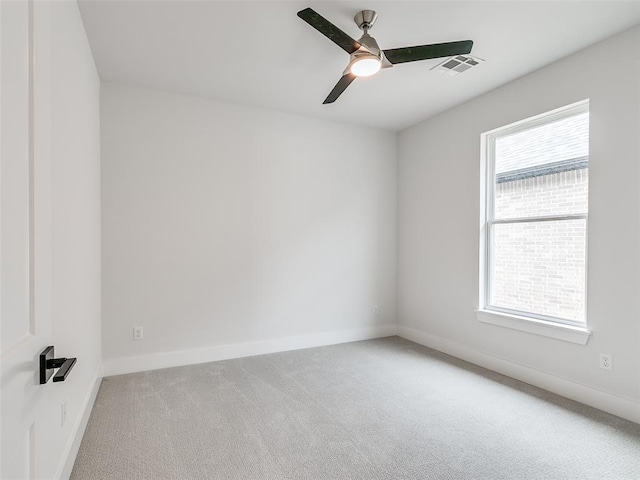 216 Pont Neuf Ct, Edmond, OK 73034 - carpeted spare room with ceiling fan and baseboards